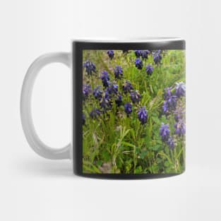 Muscari flowers on a green field Mug